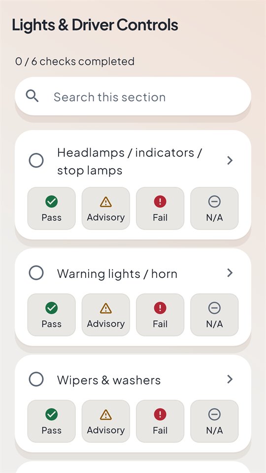 GarageCheck checklist for Lights and Driver Controls, with Pass, Advisory, Fail and N/A buttons for each item.